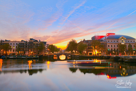 Sunrise on canal, Amsterdam, Netherlands