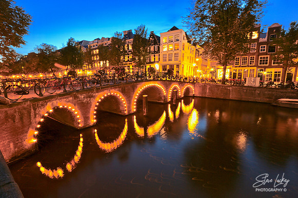 Canal bridge at dusk, Amsterdam, Netherlands