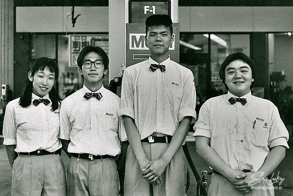 Gas station attendants, Kyoto, Japan